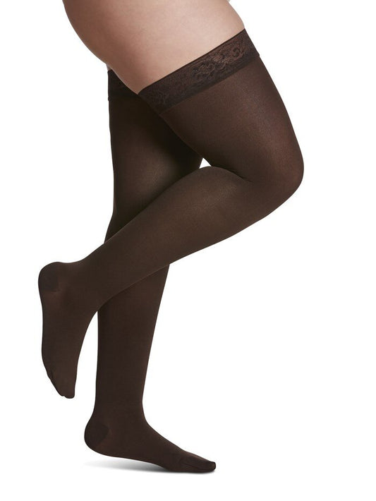 Legs of female model in Sigvaris Soft Opaque compression calf socks in espresso.