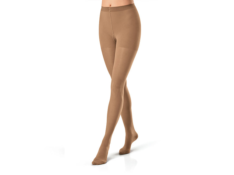 Lower body of model in waist-high JOBST UltraSheer compression tights.