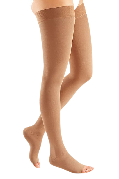 Lower legs of model in thigh-high Mediven Mondi compression socks in beige.